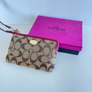 New In Box Coach Signature Logo Wristlet with Pink Strap and Liner